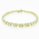 Ladies 10K Solid Yellow Gold fancy x link bracelet Length - 7 inches Width - 5mm 1